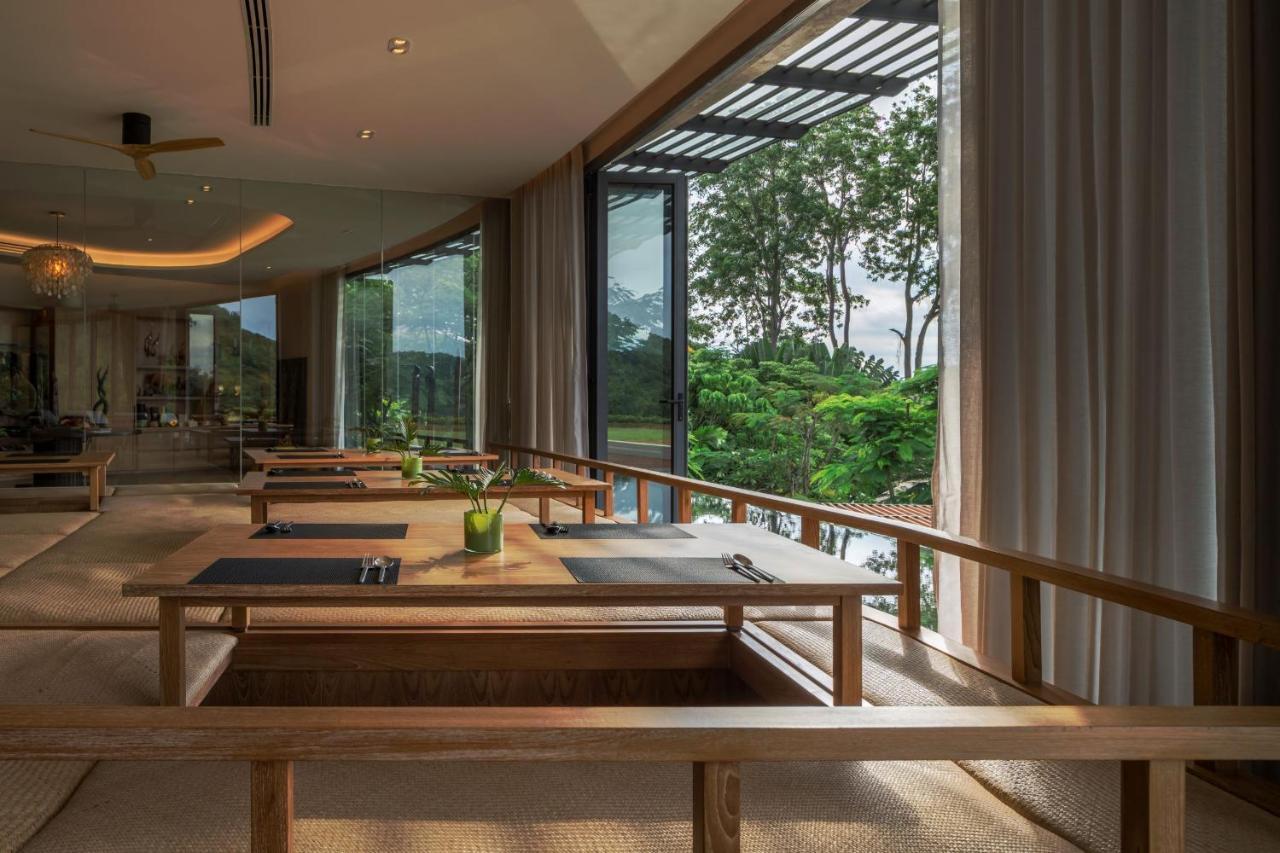 Noku Phuket Hotel Chalong Bagian luar foto The interior of the restaurant