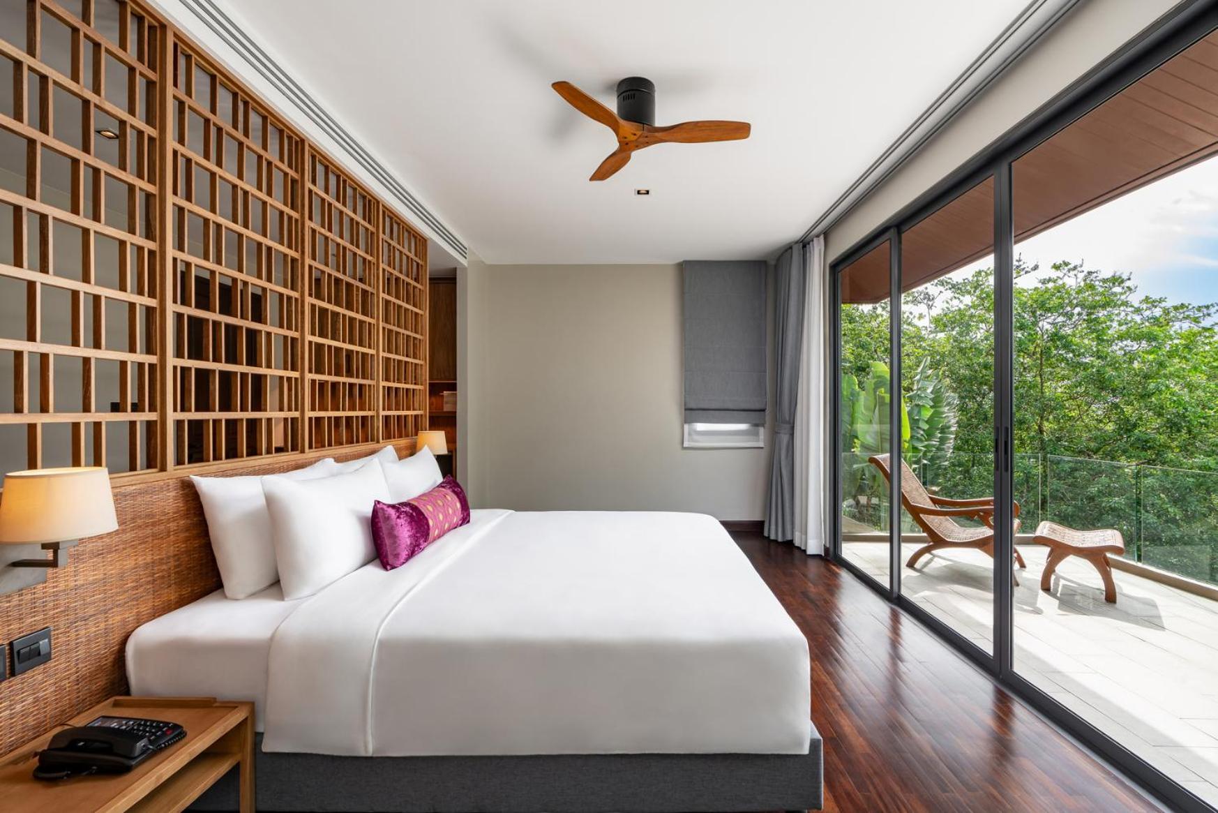 Noku Phuket Hotel Chalong Bagian luar foto A bedroom at the hotel