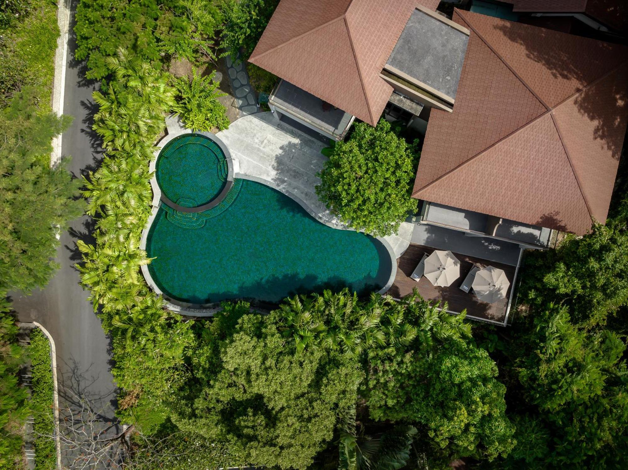 Noku Phuket Hotel Chalong Bagian luar foto Aerial view of the pool