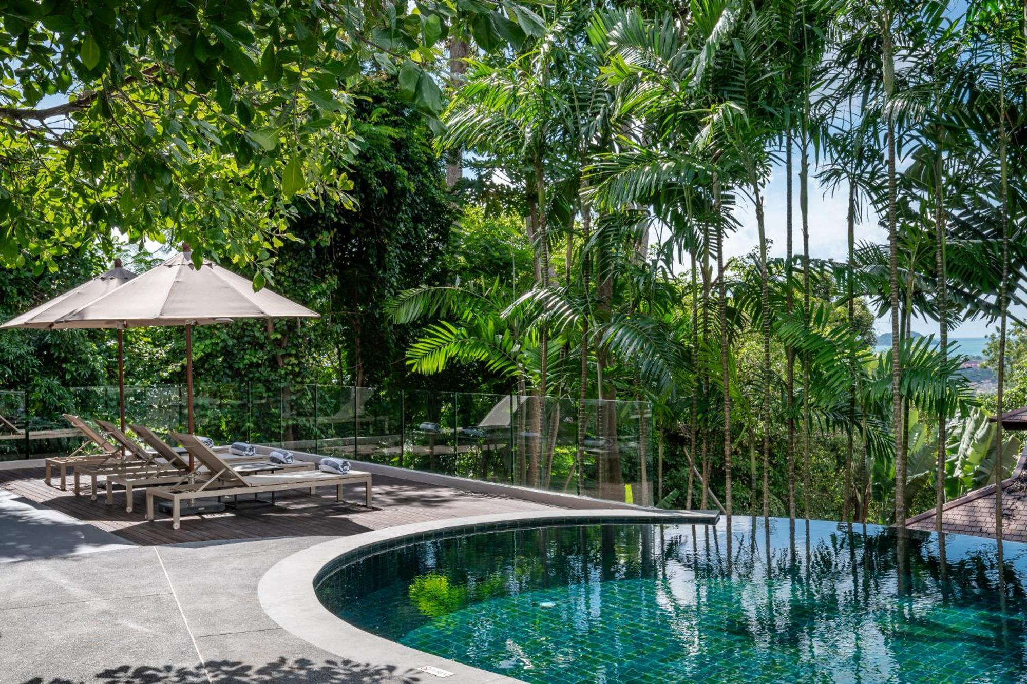 Noku Phuket Hotel Chalong Bagian luar foto The swimming pool at the resort