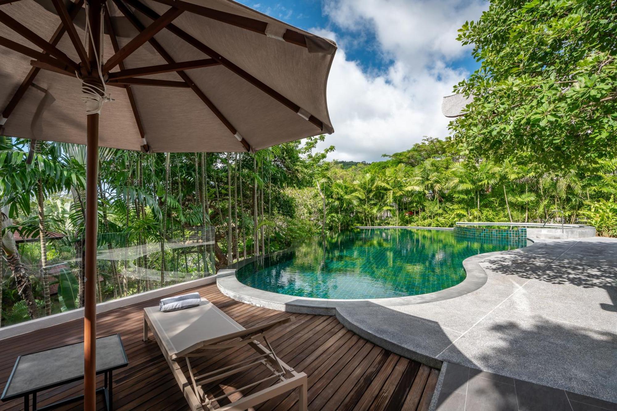 Noku Phuket Hotel Chalong Bagian luar foto The swimming pool at the resort
