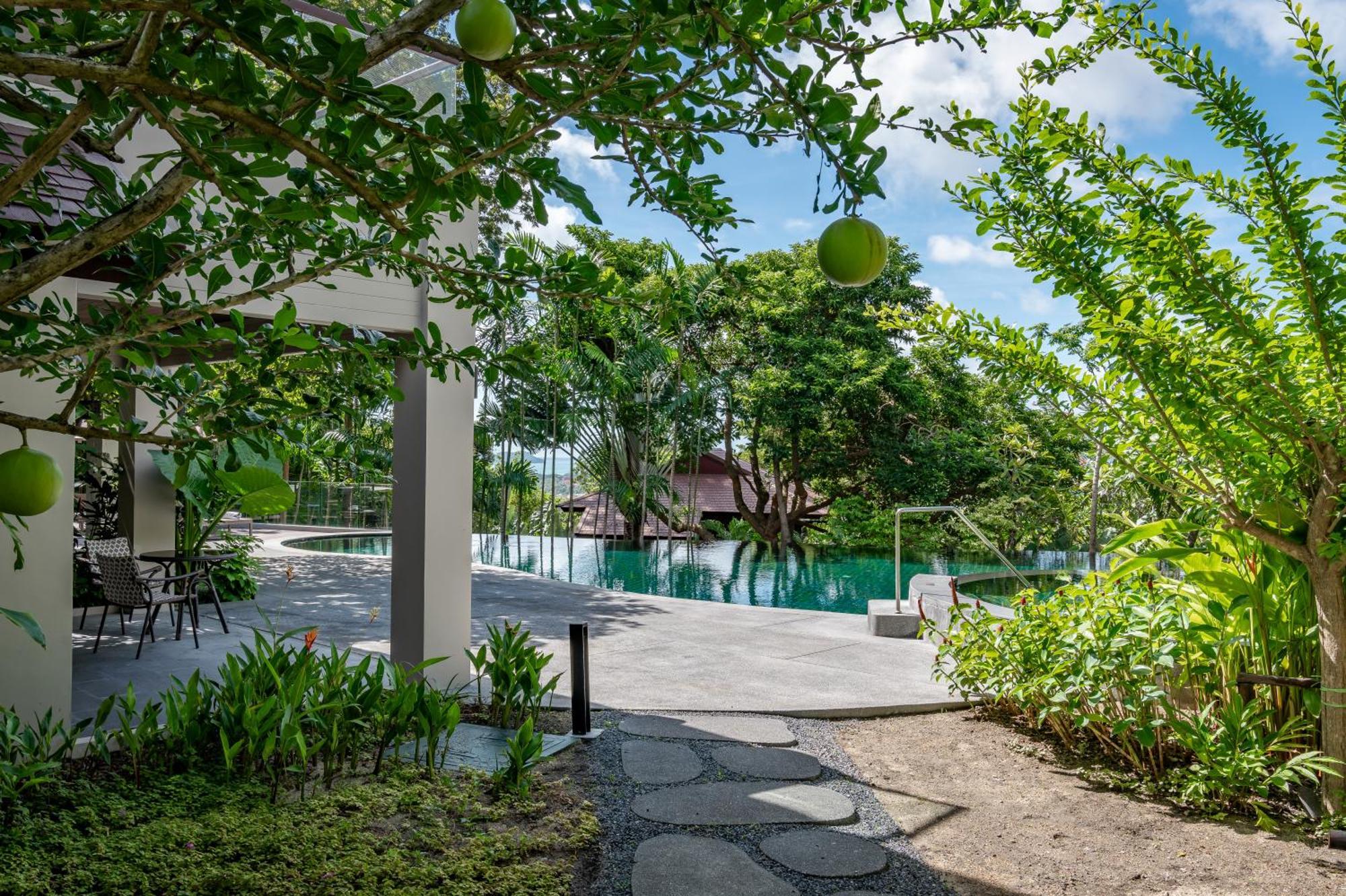 Noku Phuket Hotel Chalong Bagian luar foto The swimming pool at the resort