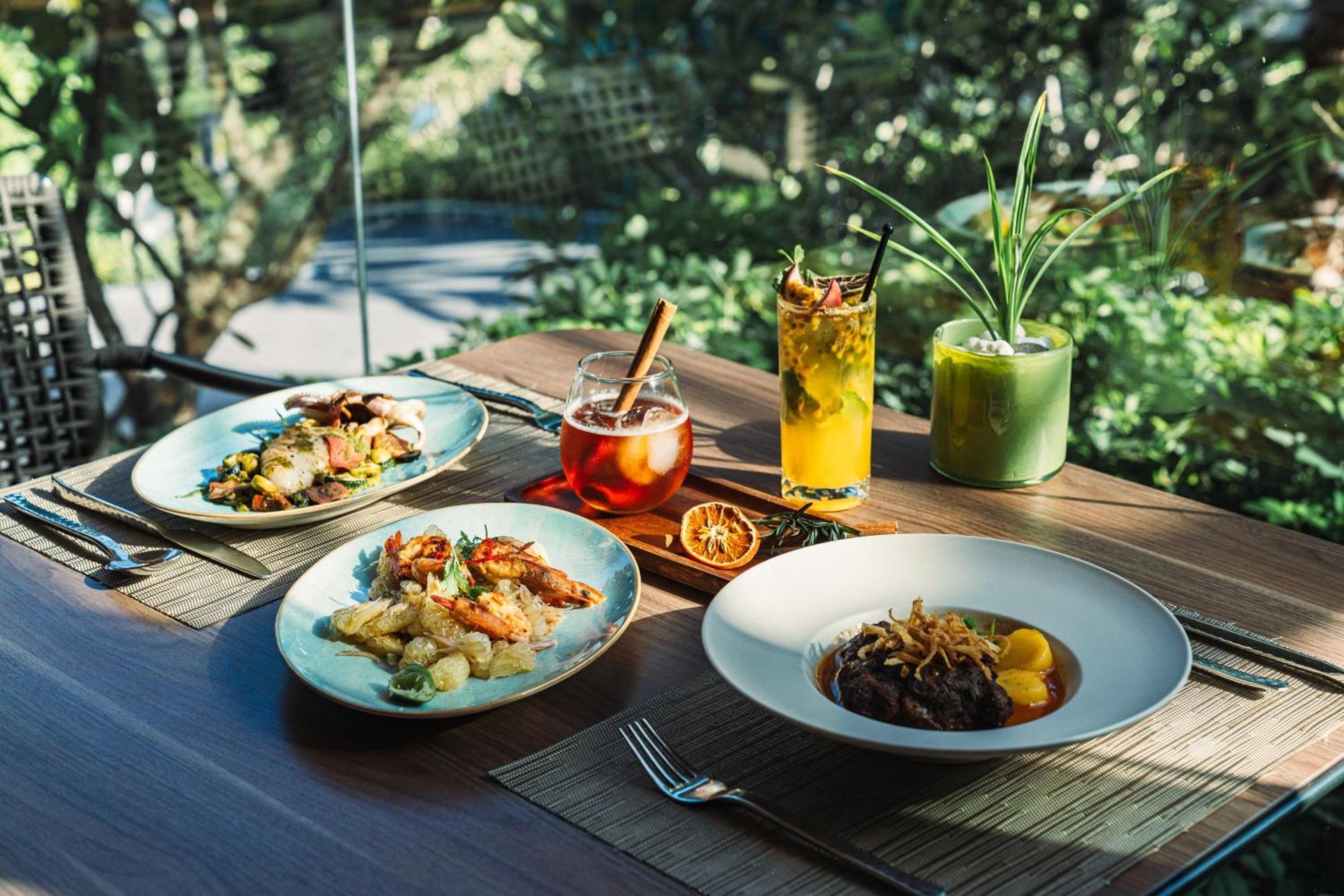 Noku Phuket Hotel Chalong Bagian luar foto A selection of dishes at the restaurant