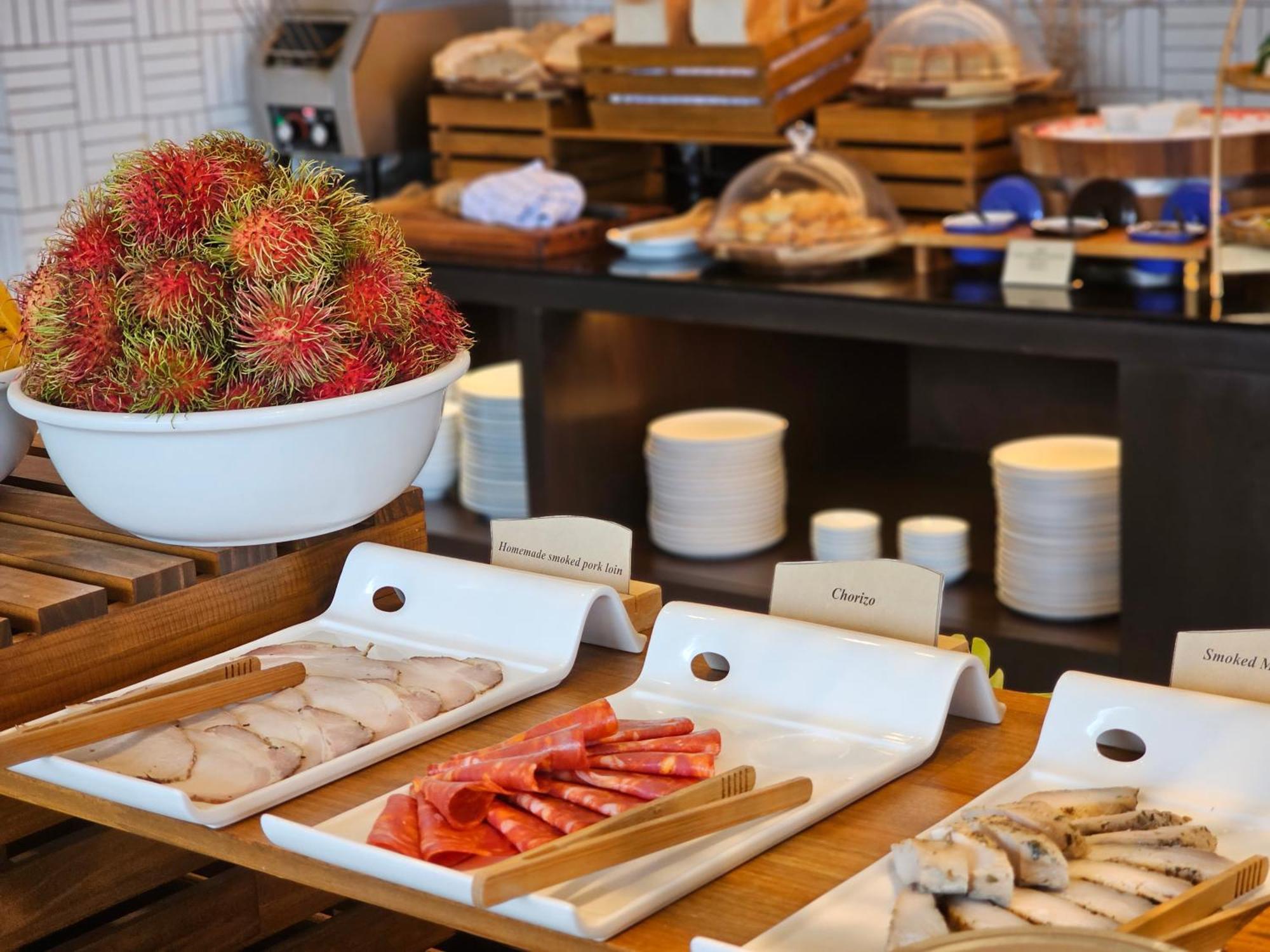 Noku Phuket Hotel Chalong Bagian luar foto A buffet at a hotel