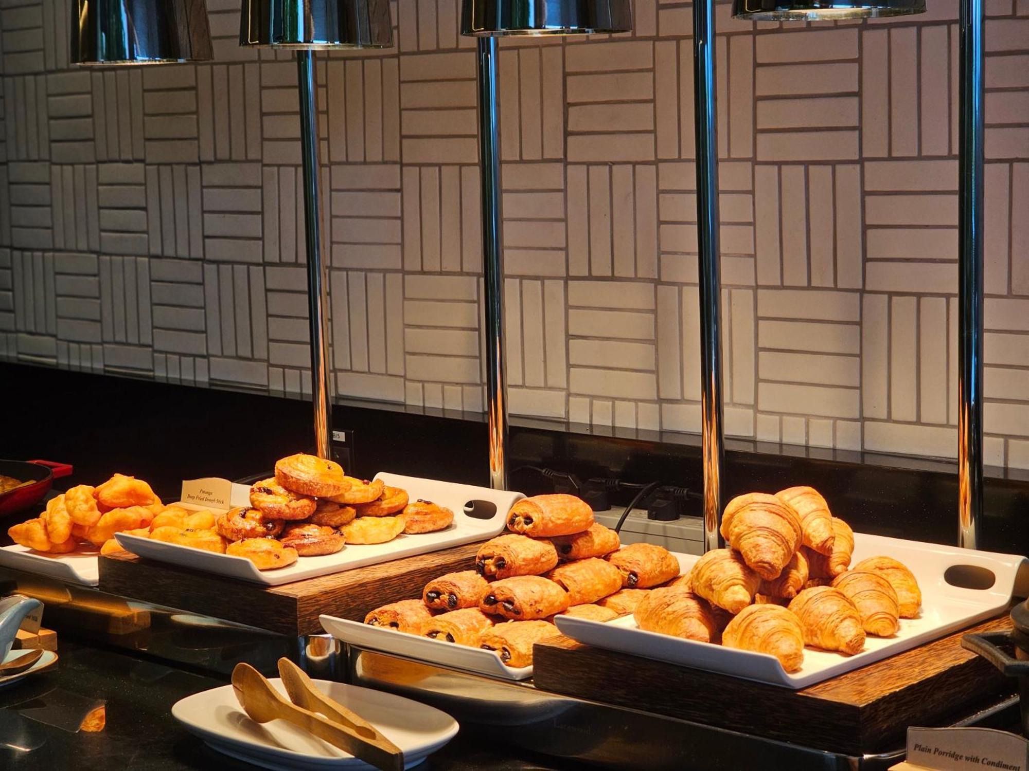 Noku Phuket Hotel Chalong Bagian luar foto A selection of pastries at a buffet