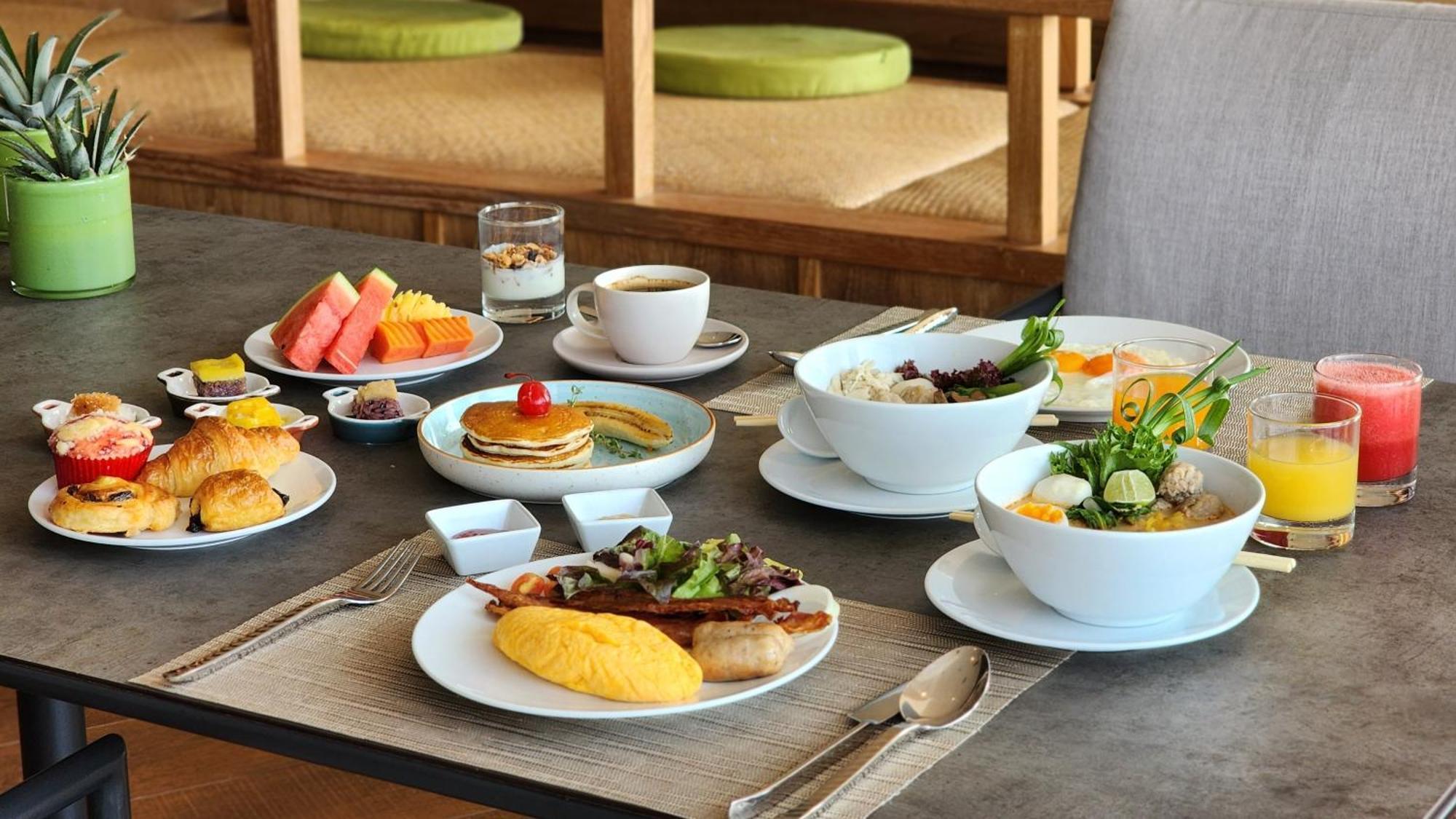 Noku Phuket Hotel Chalong Bagian luar foto A breakfast at the hotel