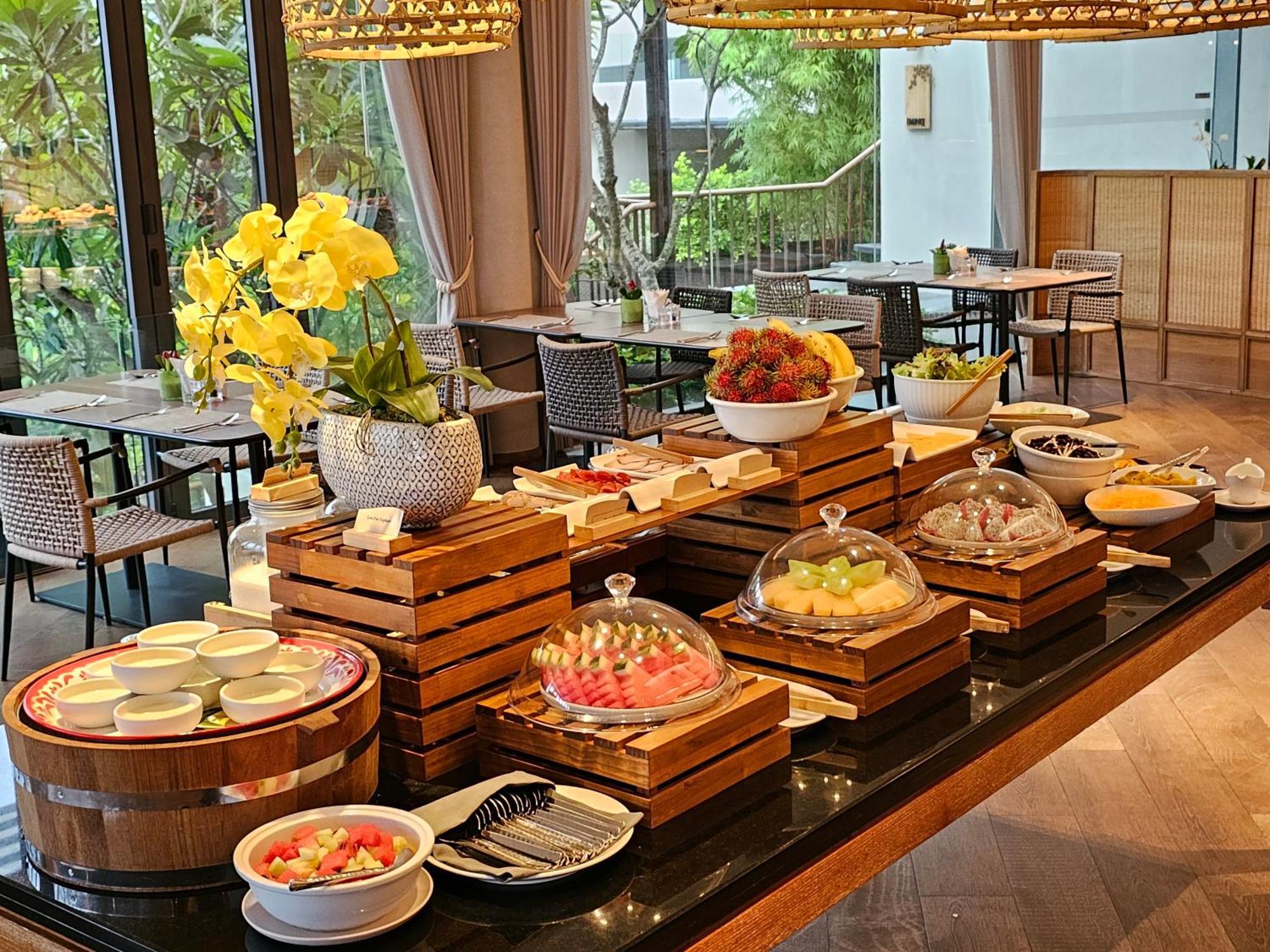 Noku Phuket Hotel Chalong Bagian luar foto A buffet at a hotel