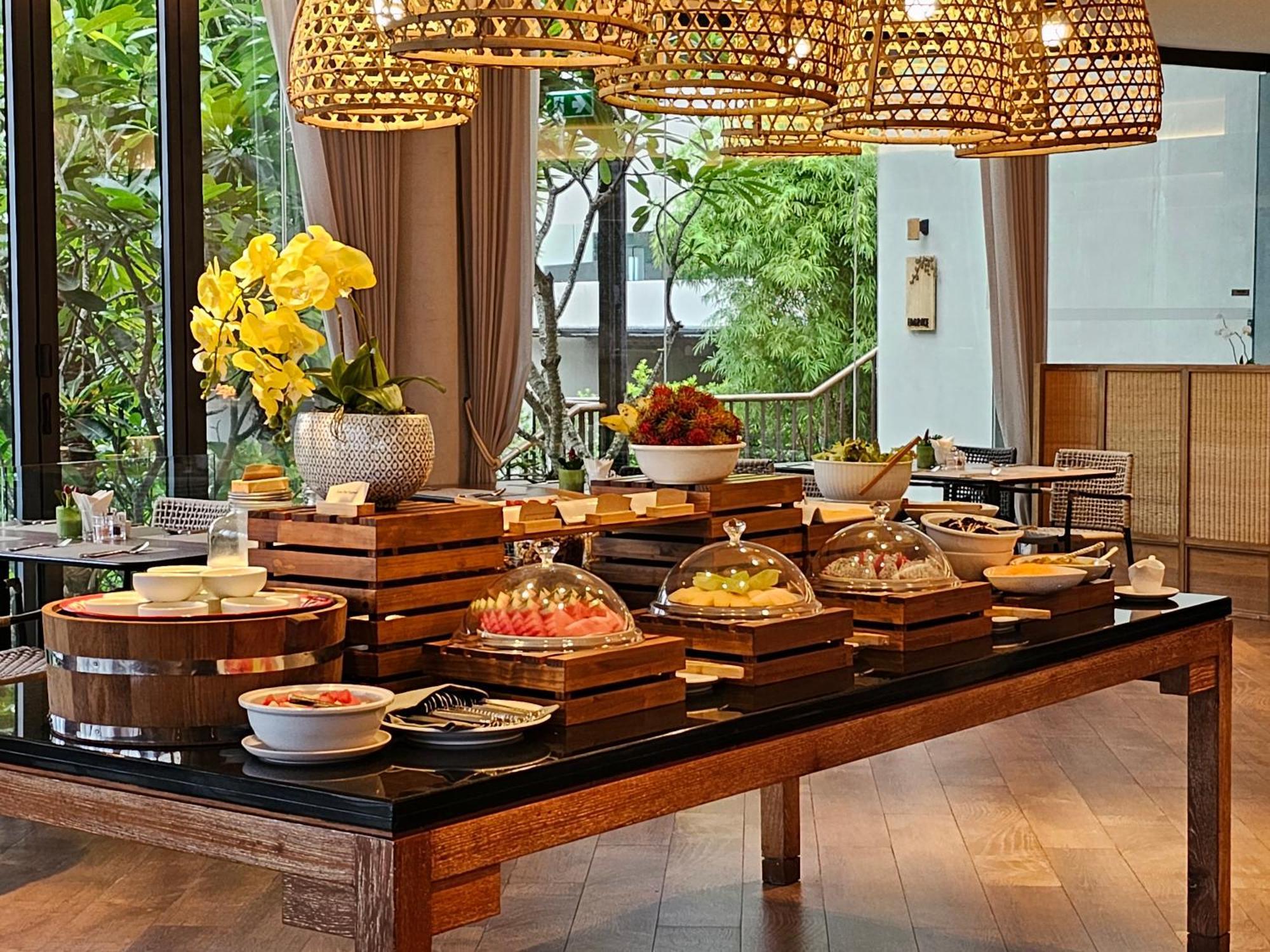 Noku Phuket Hotel Chalong Bagian luar foto A buffet at a hotel